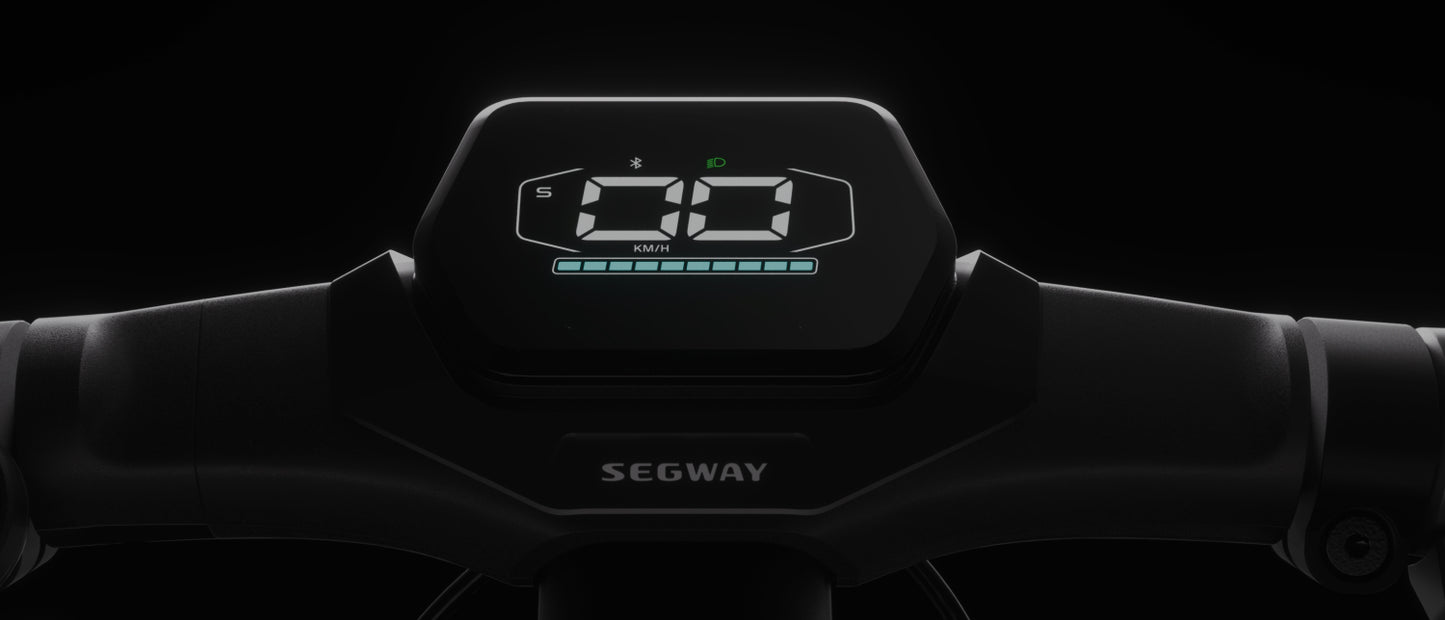 The Segway ZT3 Pro's handlebar display, vividly showing speed and battery level at night, is complemented by advanced suspension, ensuring smooth off-road navigation across varied terrains.