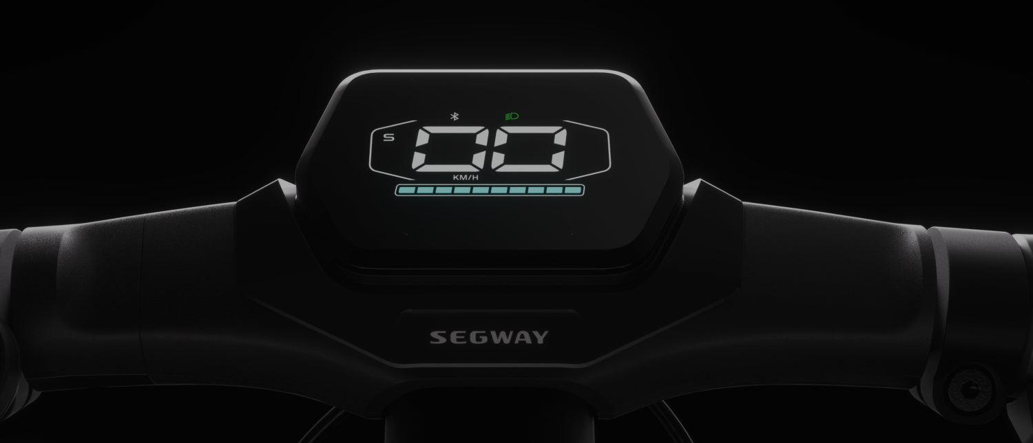 The Segway ZT3 Pro's handlebar display, vividly showing speed and battery level at night, is complemented by advanced suspension, ensuring smooth off-road navigation across varied terrains.