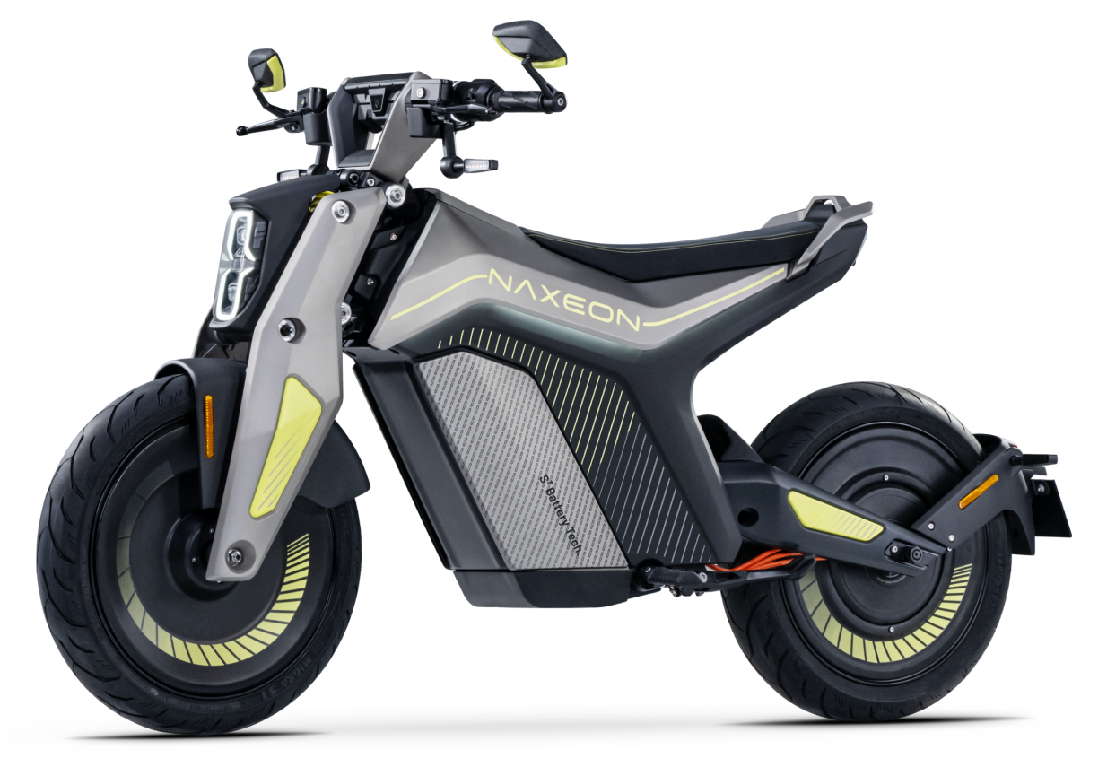 A sleek, modern electric scooter with a streamlined design, the Naxeon - I AM features large wheels, a sturdy frame, and yellow accents—perfect for high-performance urban mobility.