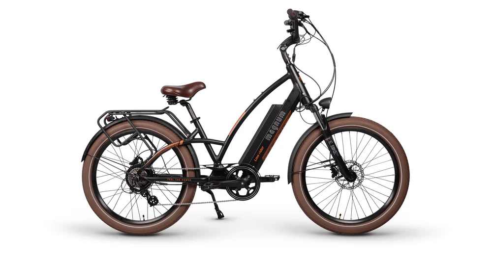 Magnum Low Rider 2.0 by Magnum: a black electric beach cruiser featuring brown tires, rear cargo rack, front and rear fenders, upright handlebars, and a frame-mounted battery.