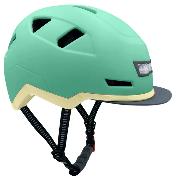 The XNITO Helmet XNITO - Old School - Mint is a teal e-bike helmet featuring an aerodynamic design, black straps, ventilation slots, and a small visor.