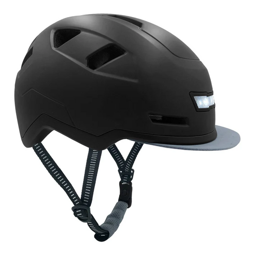 The XNITO Helmet XNITO - Old School - Obsidian is a matte black e-bike helmet with vent openings, dual certified safety, integrated front LED lights, and an adjustable chin strap with reflective detailing.