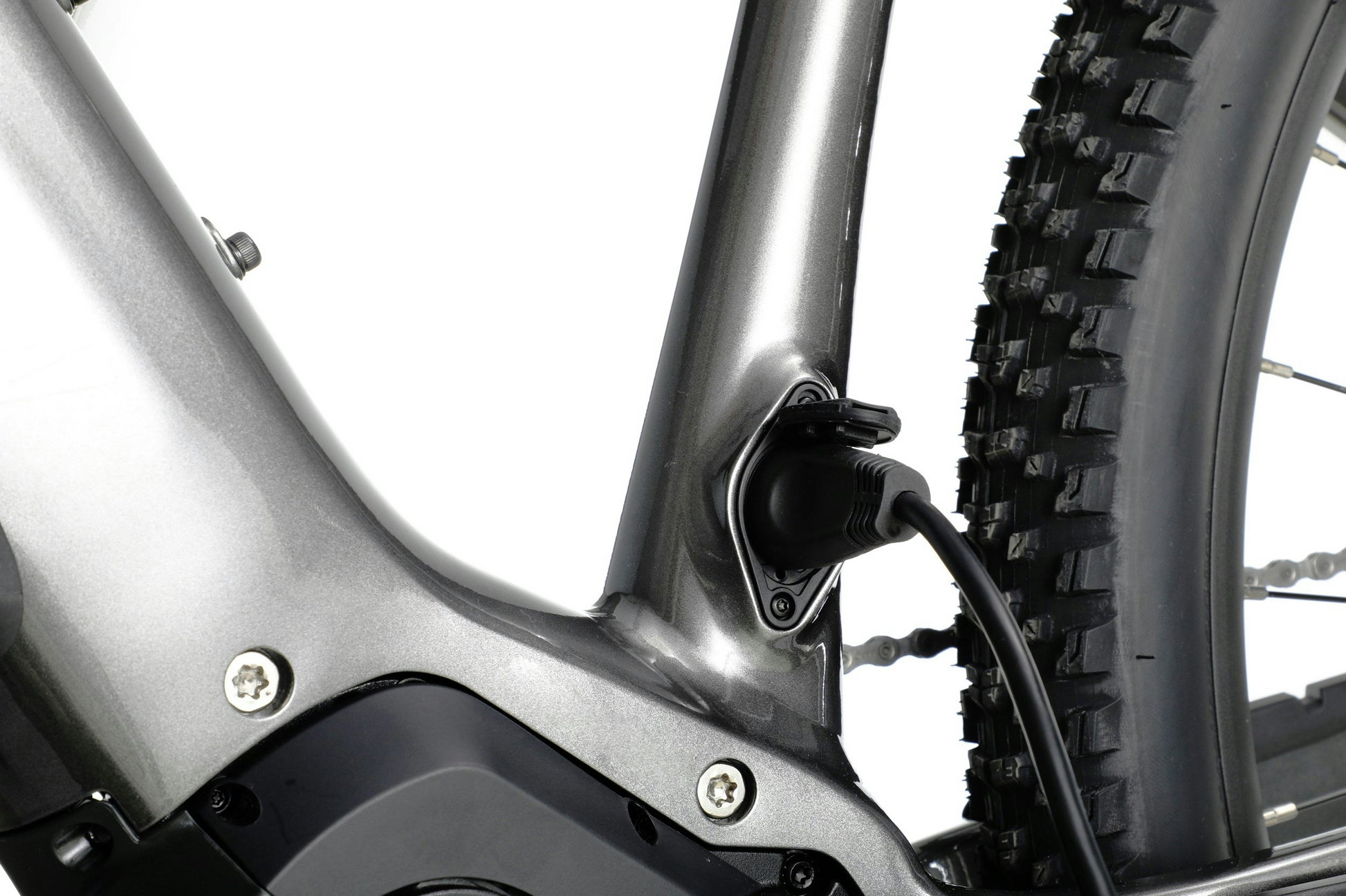 Close-up of an Aventon Ramblas eMTB frame showing the battery mounting area and mid-drive motor cable.