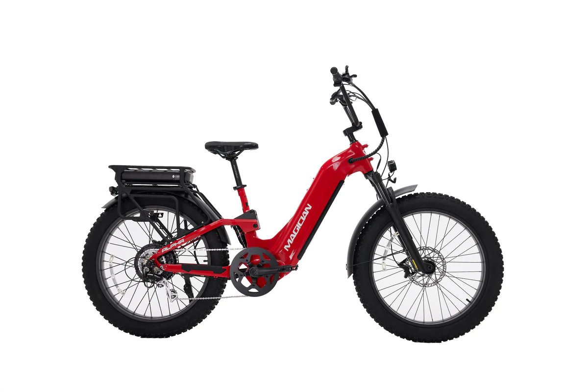The Magician Alpha by Magician is a red high-power electric bike with thick tires, rear rack, and front suspension, shown in profile on a white background.
