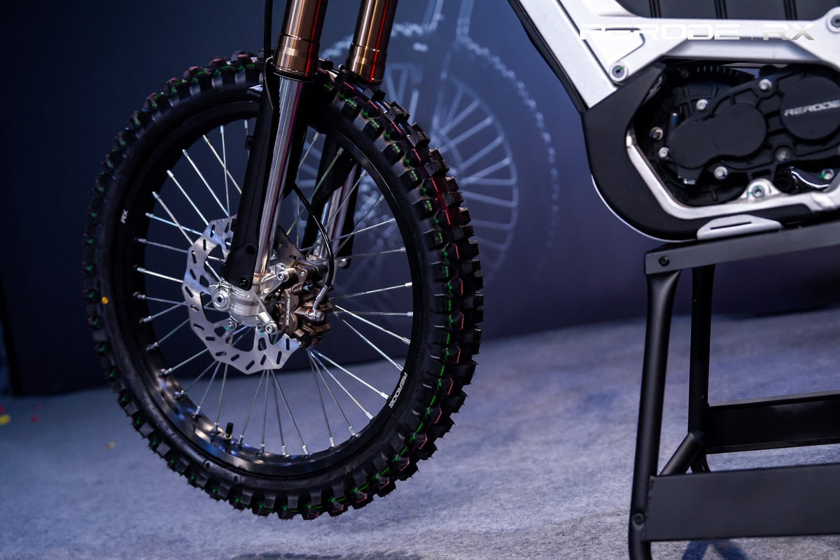 RERODE RX Electric Dirt Bike front wheel and suspension at the launch display