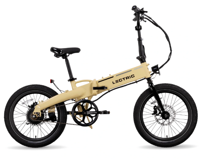 A beige Letric XP Lite 2.0 Long-Range eBike with black tires, an adjustable seat, and handlebars. The bike boasts a compact frame with the brand name "Letric" visible on the side, and features hydraulic brakes for reliable stopping power.