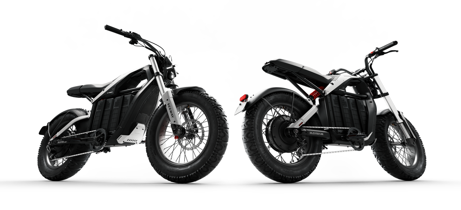 Two Segway Xyber Electric Bikes, in black and white, are showcased against a dark background. Featuring thick tires and a minimalist design from various angles, they're ideal for high-performance eBike enthusiasts seeking adventures around Tampa Bay.