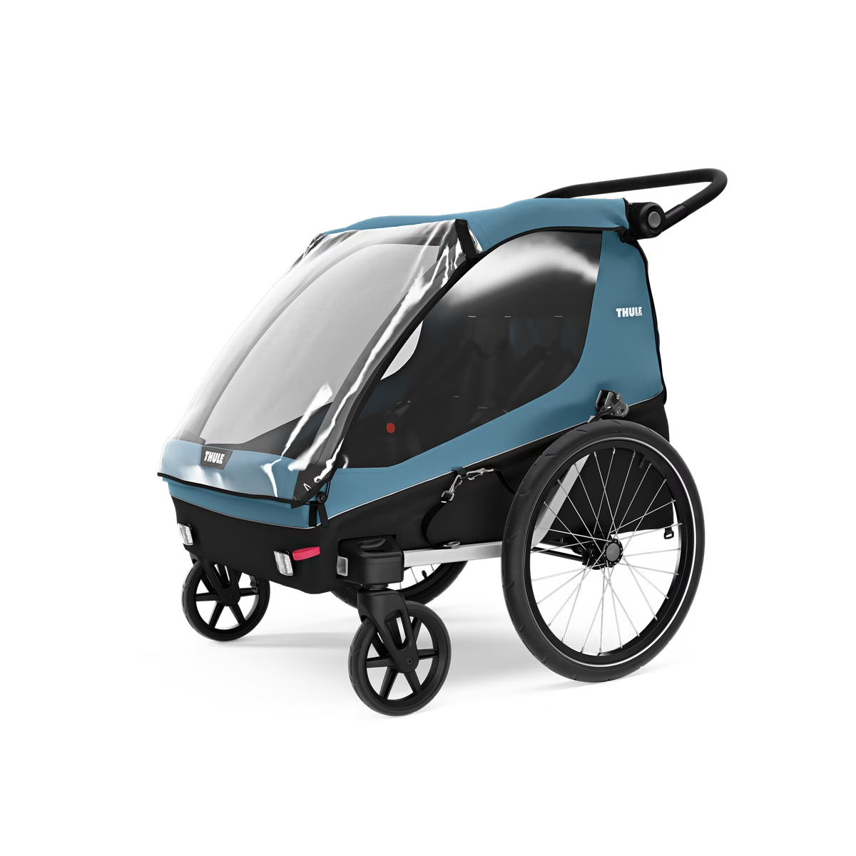 A Thule Courier bike trailer featuring a clear cover, two large rear wheels, and two smaller front wheels, perfect for family outings.