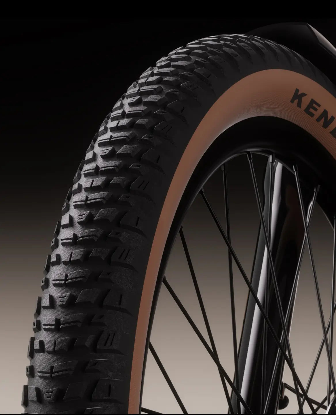 Close-up of a Velotric Discover M wheel by Velotric, highlighting its black treaded tire with tan sidewall and visible spokes against a gradient background.
