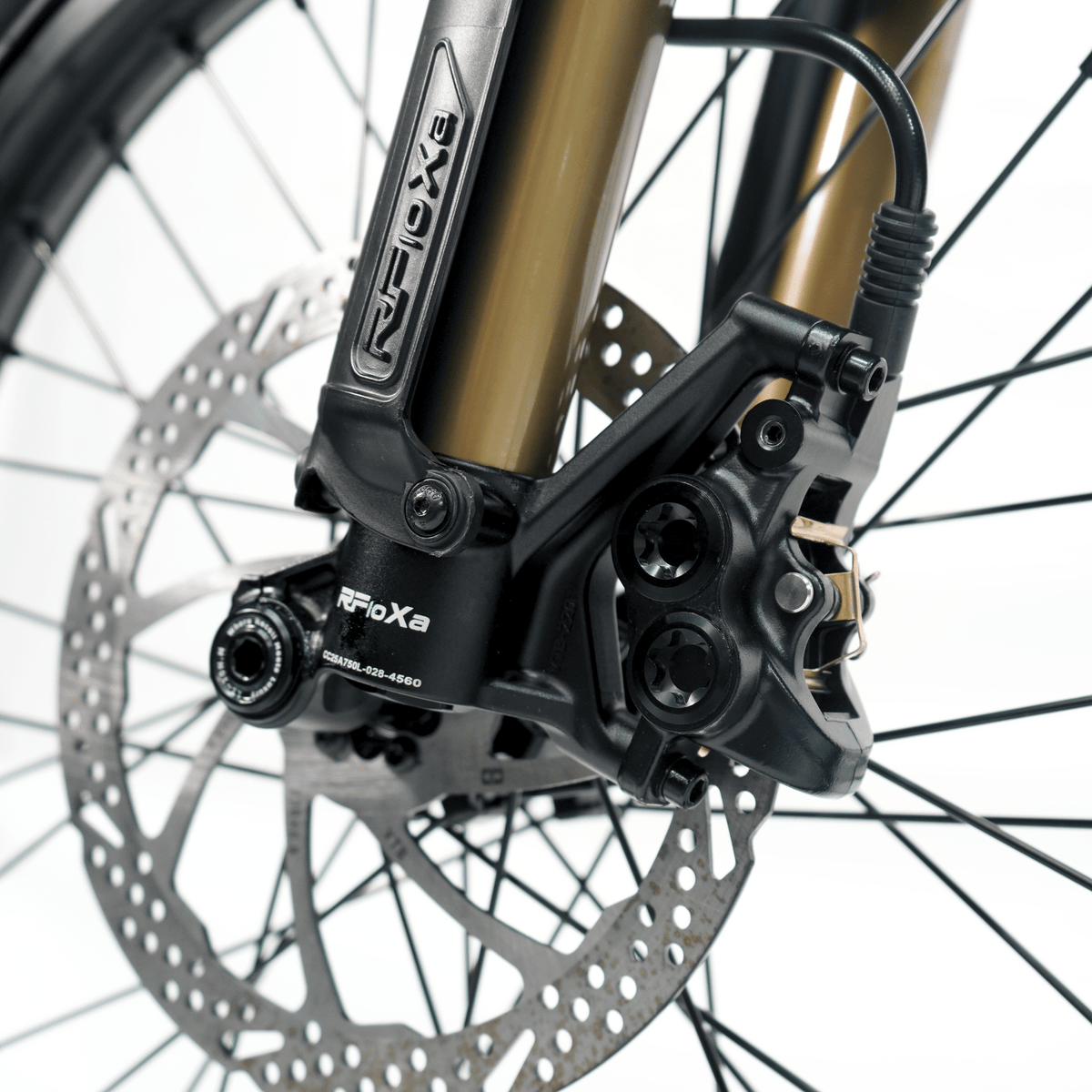 Ventus V1+ EVO electric dirt bike, front hydraulic brake rotor detail