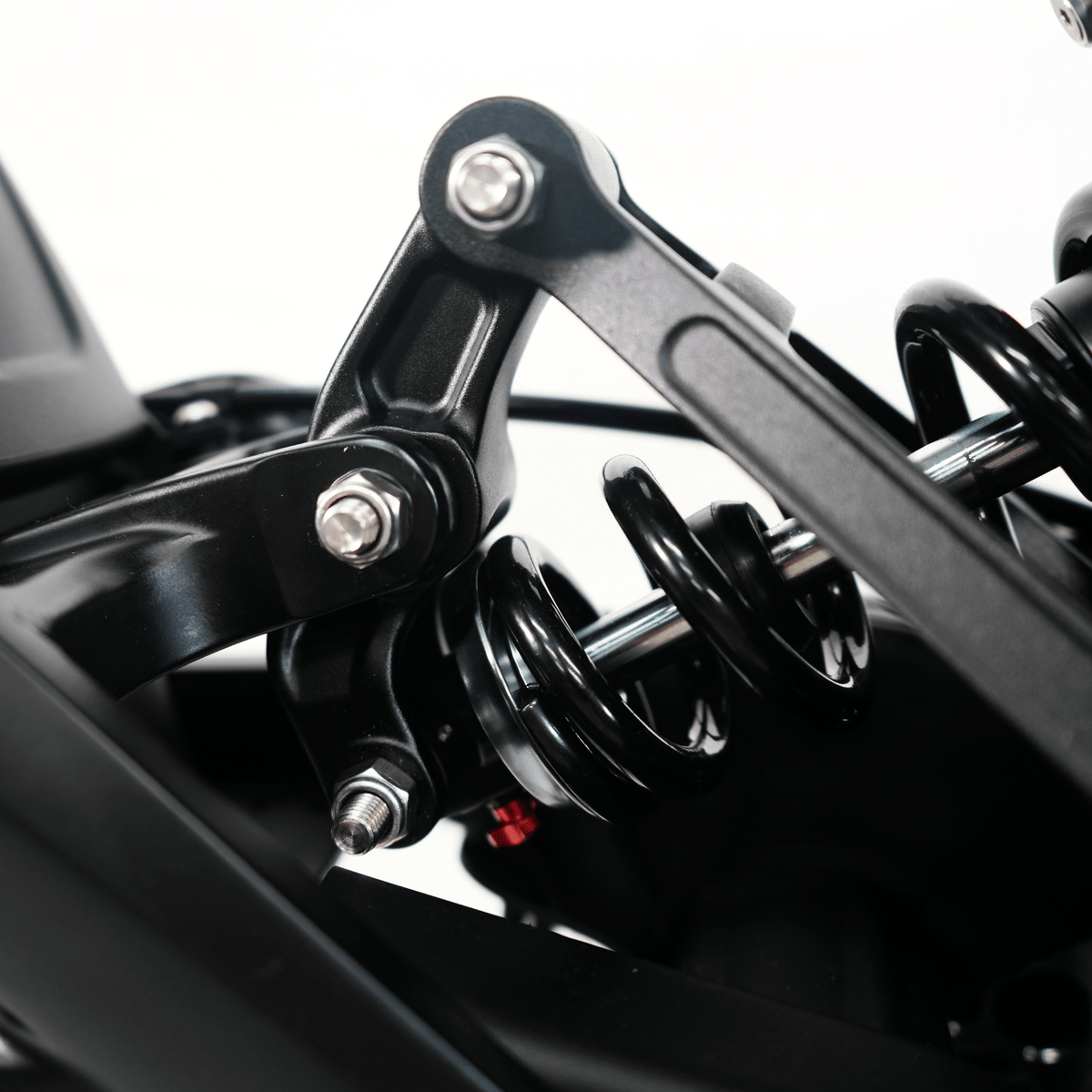 Ventus V1+ EVO electric dirt bike, rear shock and linkage detail