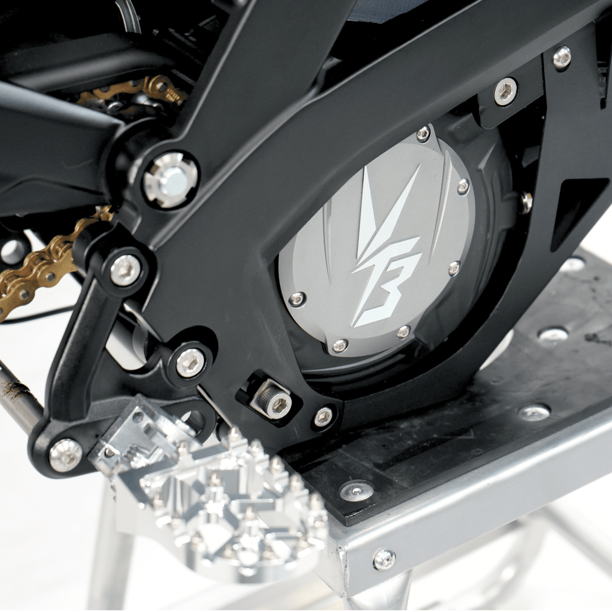 Ventus V1+ EVO electric dirt bike, motor and foot peg detail
