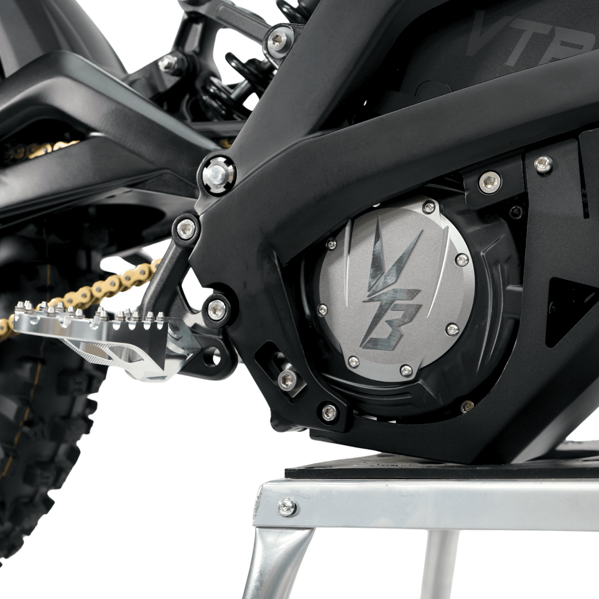 Ventus V1+ EVO electric dirt bike, side motor and chain drive close-up