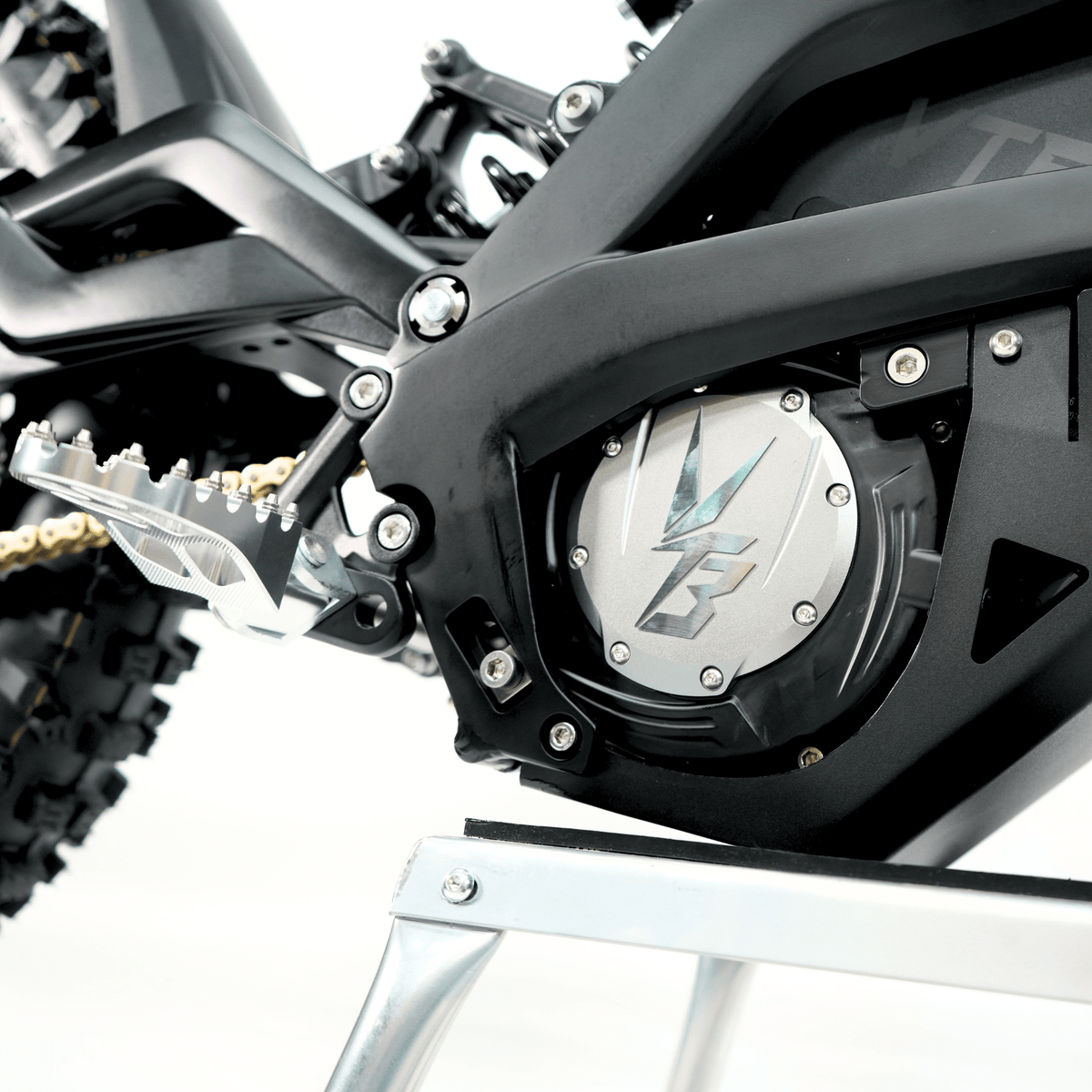 Ventus V1+ EVO electric dirt bike, motor cover and chain drive detail