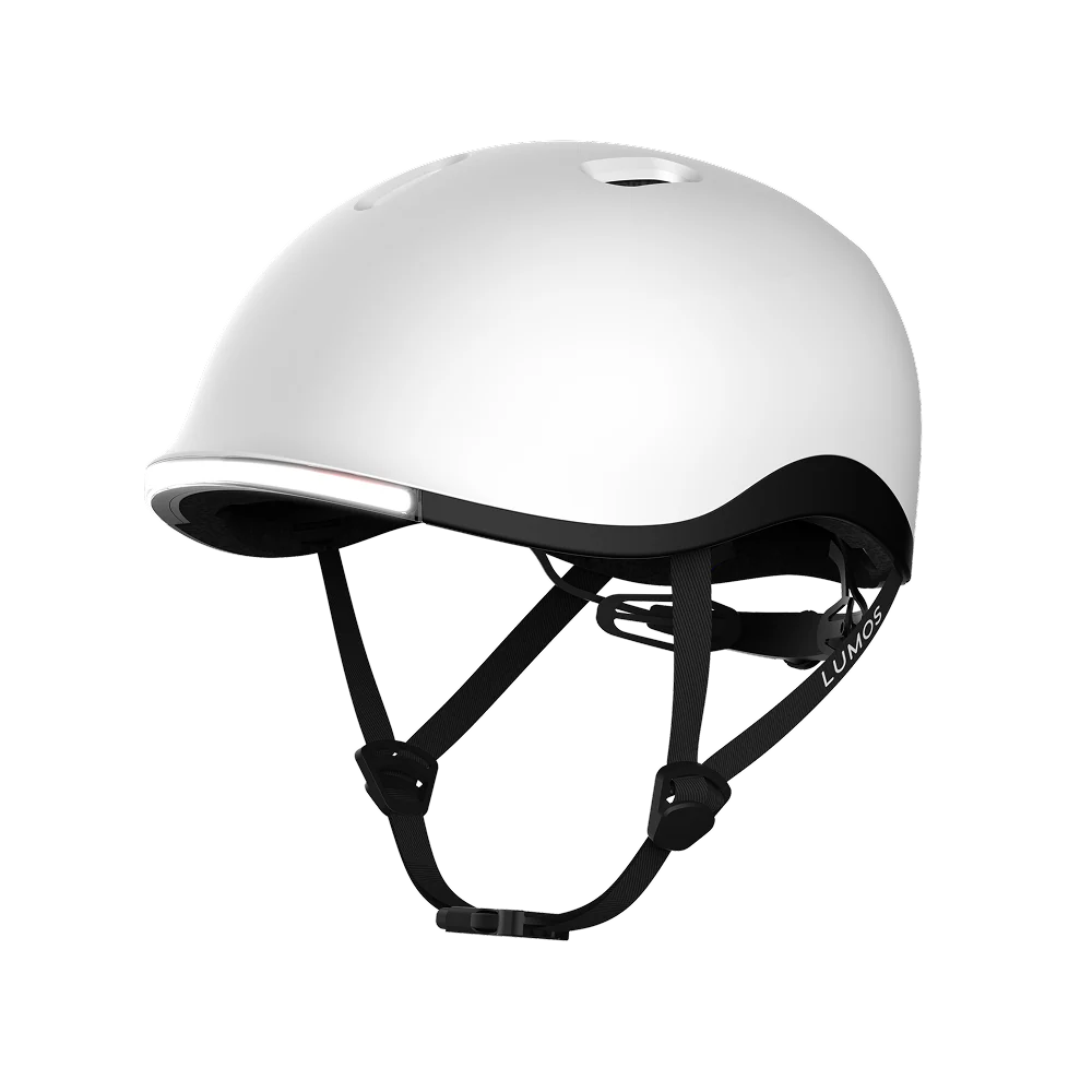 The Lumos NYXEL helmet features a white high-visibility design, black adjustable straps, and ventilation holes, showcased on a plain light background.