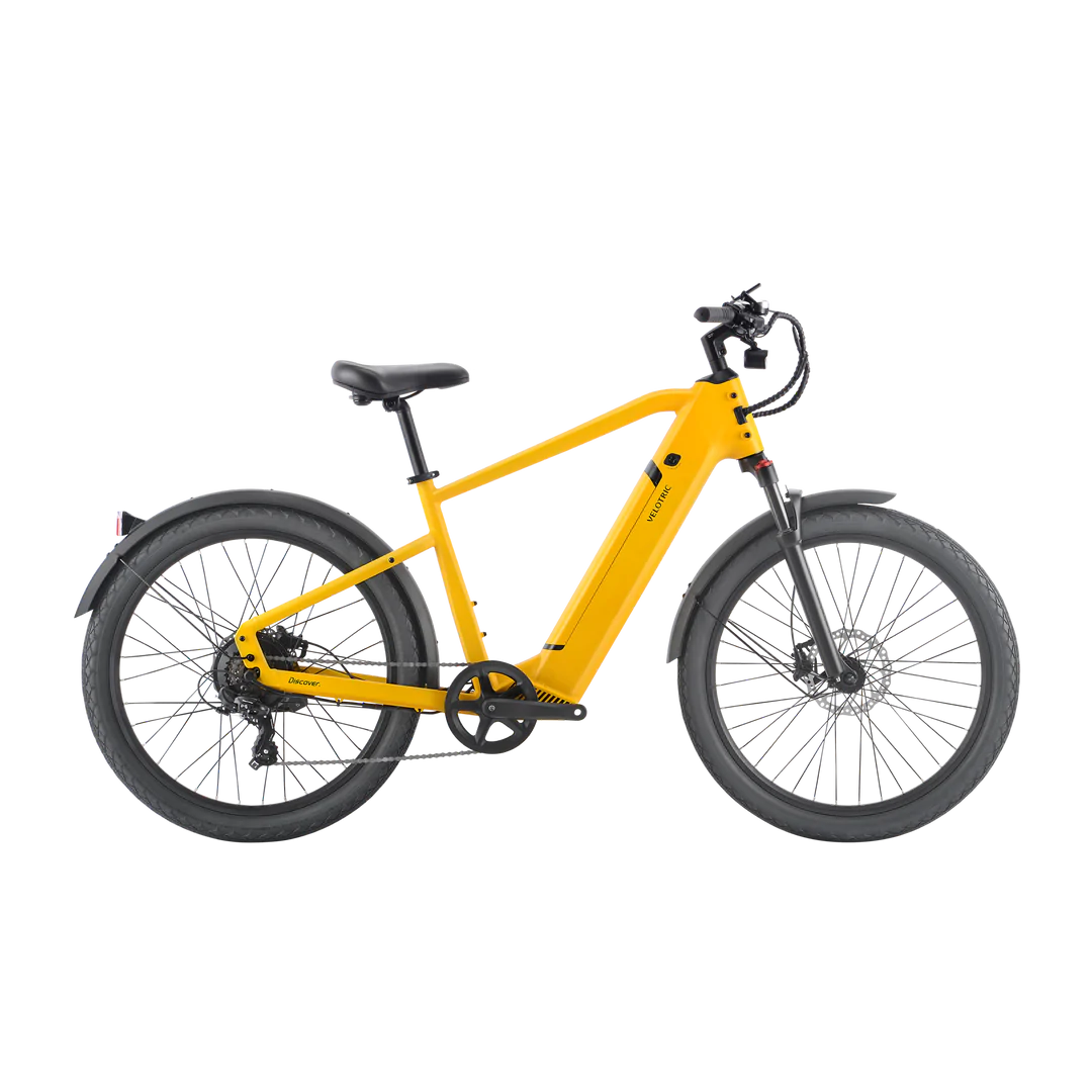 A yellow Velotric - Discover 1 - High Step - Mango electric bike on a black background.